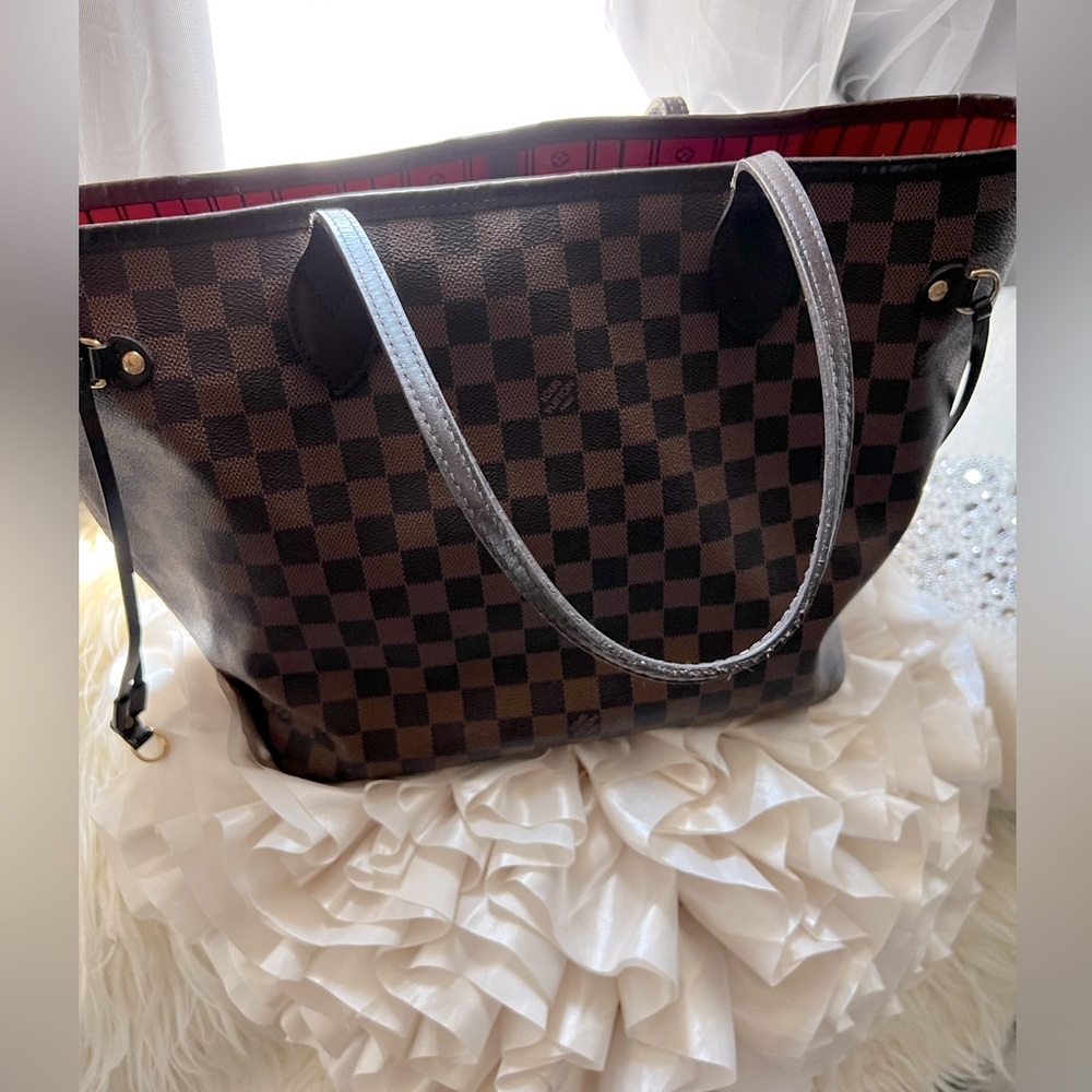 Authentic Louis Vuitton never full bag mainly used as a carry on bag